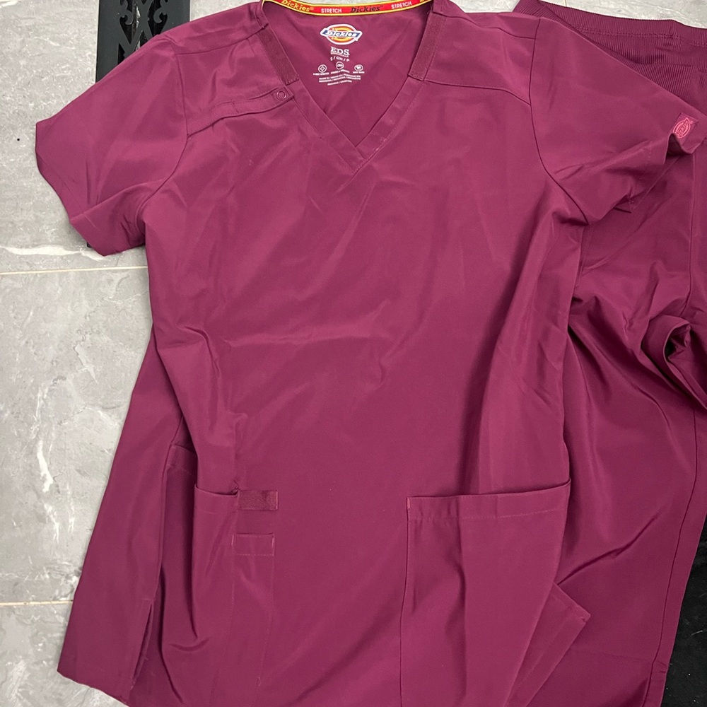 Scrubs worn but in good condition